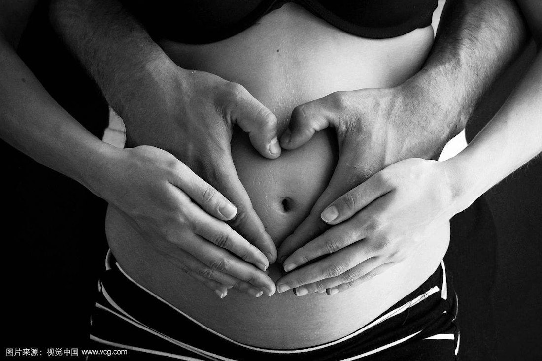 Premium Photo  Happy pregnant women with big belly on colored